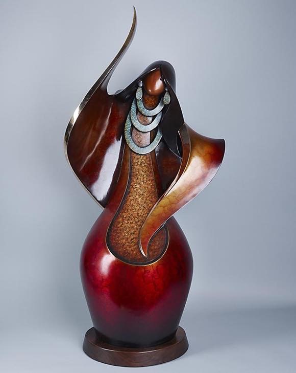 Kim Seyesnem Obrutz - “Greeting the Sun," bronze, 2000. Photo by Willie Peterson.