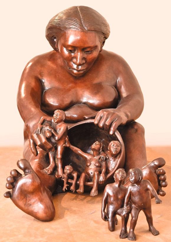 Roxanne Swentzell - “Storyteller/That Way," bronze, 2014. Photo by Phillip Karshis/K photo.