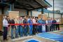 District 5 Councilman Ronald Perry prepares to cut the ribbon at the new Choctaw Wellness Center in Stigler. Chief Gary Batton, Assistant Chief Jack Austin Jr., the Choctaw Nation Tribal Council, and other officials and citizens of Haskell County particip